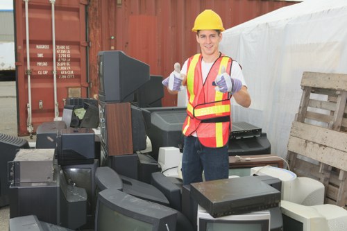 Professionals clearing a living room in Belgrave